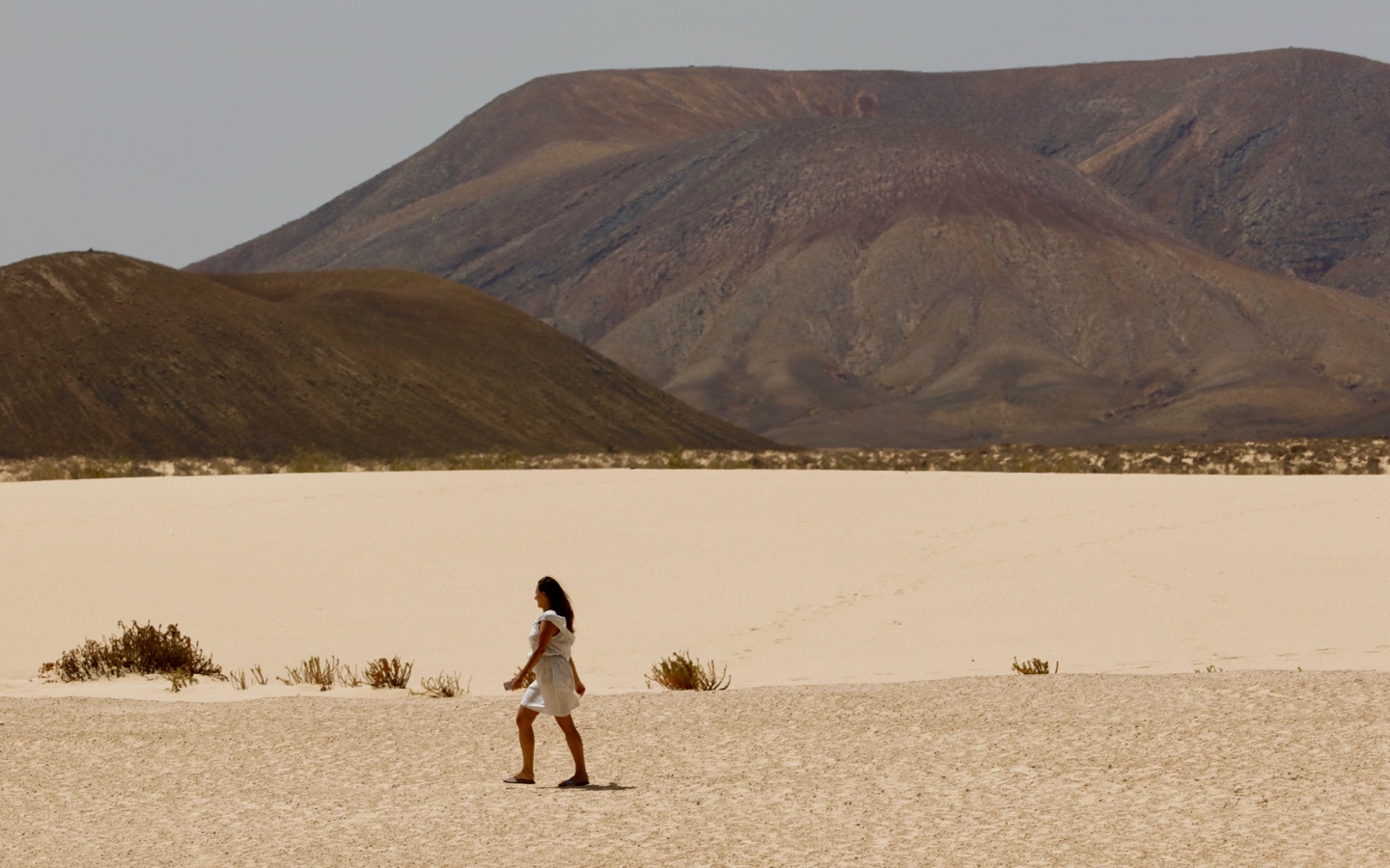 Woman Walking in Desert
