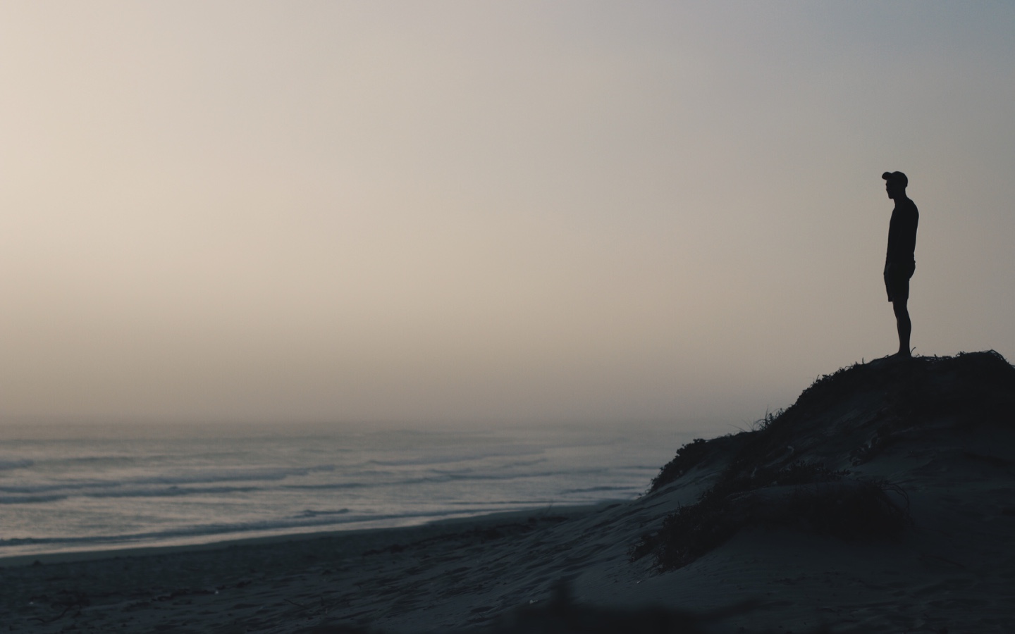 Silhouette Of Man At Beach
