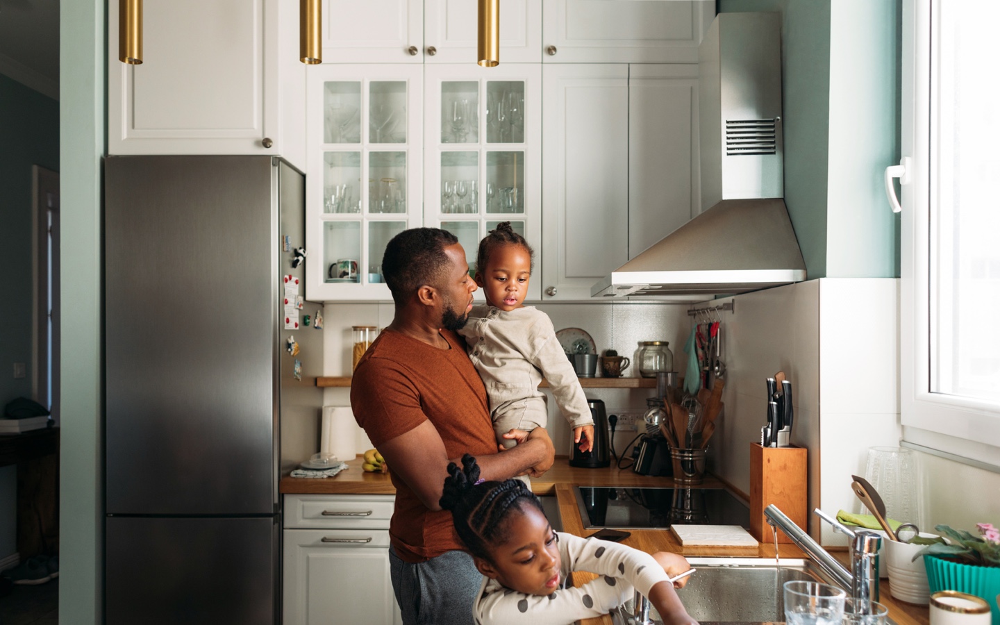 Father in The Kitchen With Daughters