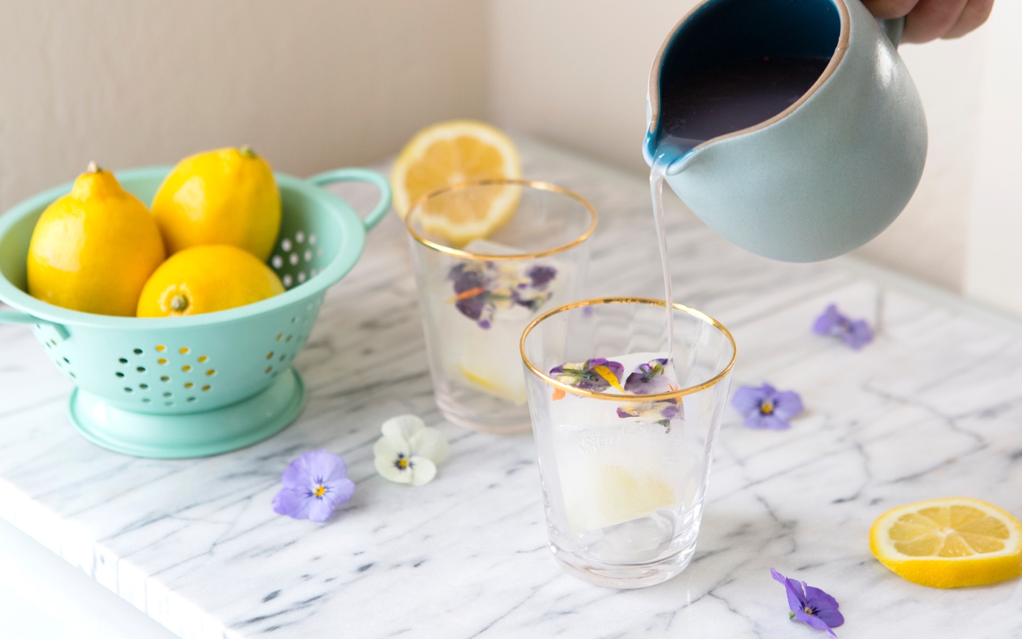 Pouring Drink with Flower Ice Cubes