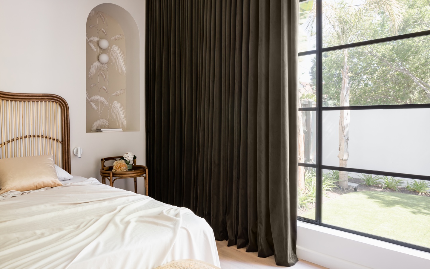 Bedroom With Earth Tone Design And Big Windows