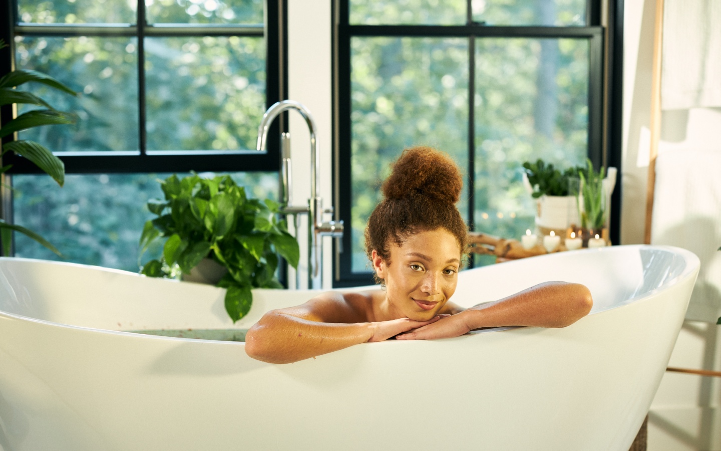 Woman Sitting In Bathtub