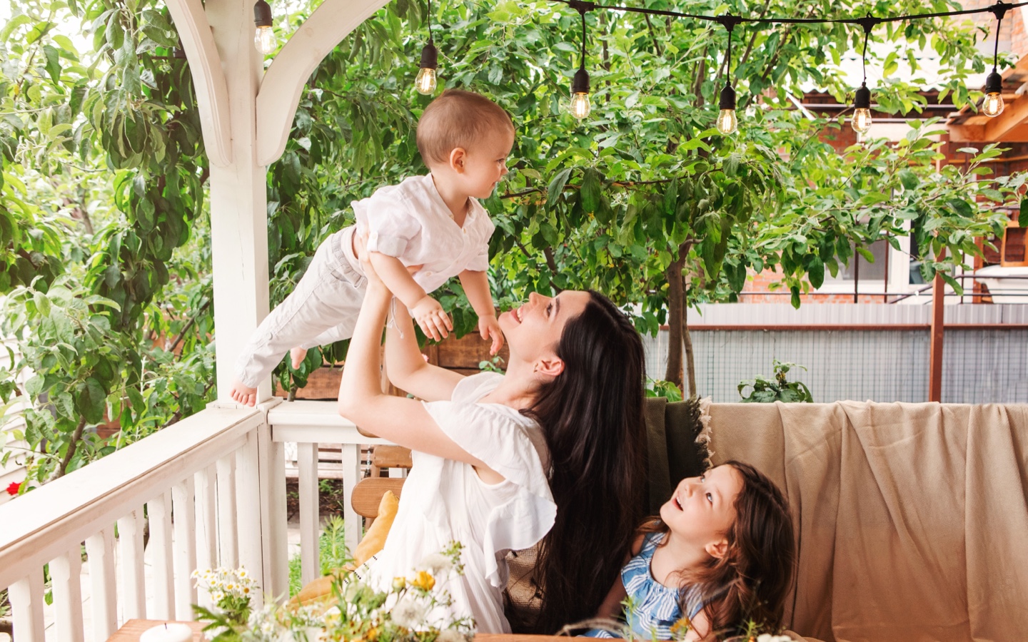 Mom And Children Eating Outside