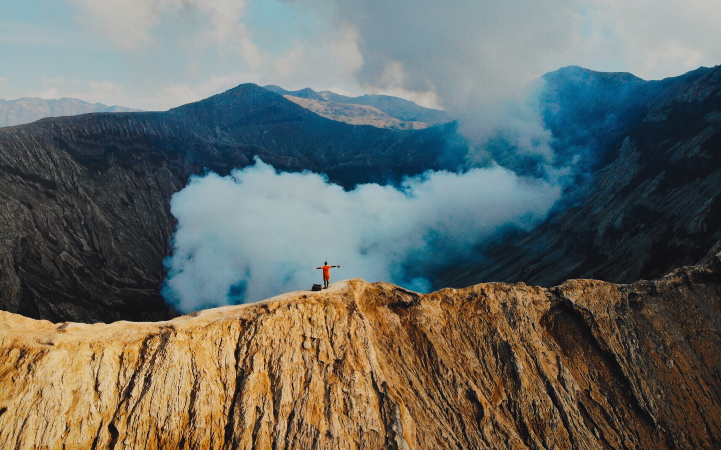 Person Hiking Near Crater