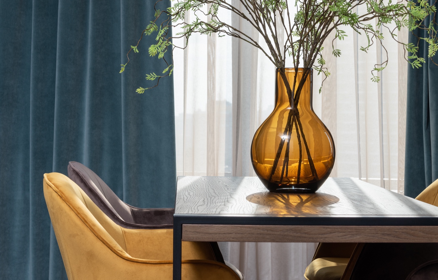 dining room with blue velvet curtains
