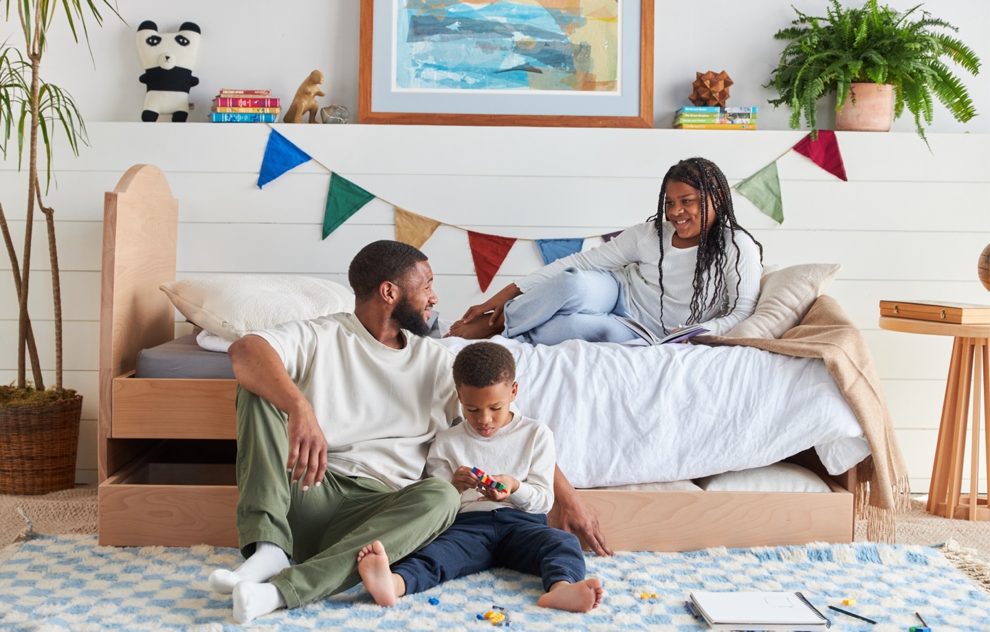 Family with their Eco Organic Kids Mattresses and Eco Trundle Bed