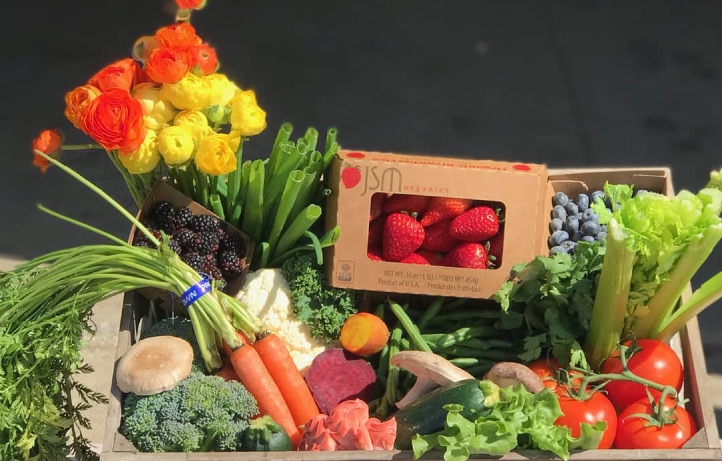 JSM Organics fresh produce and flowers box