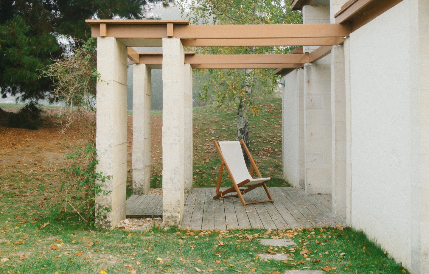 backyard of modern cottage with chair