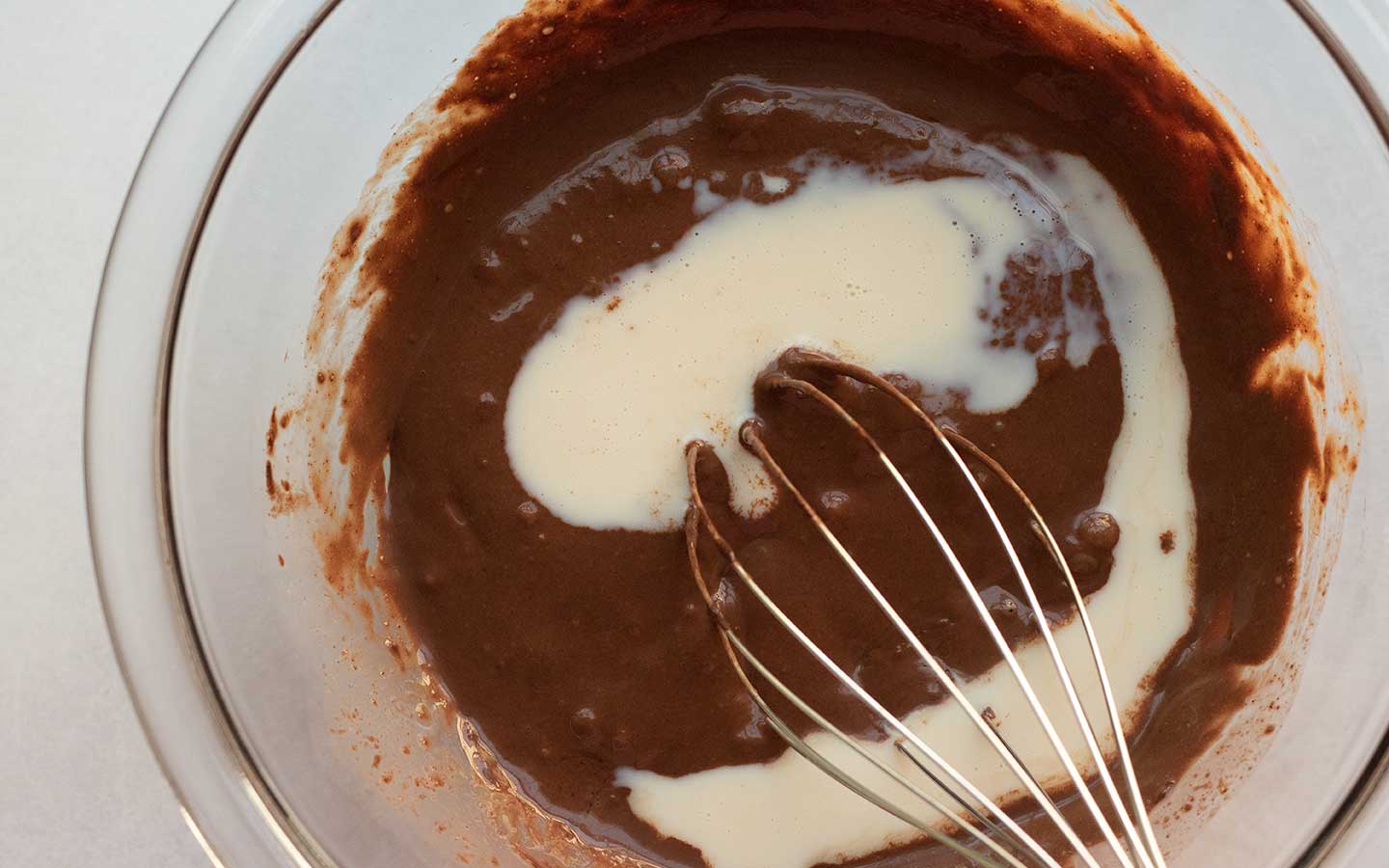 whisking together chocolate peanut butter chia pudding indgredients