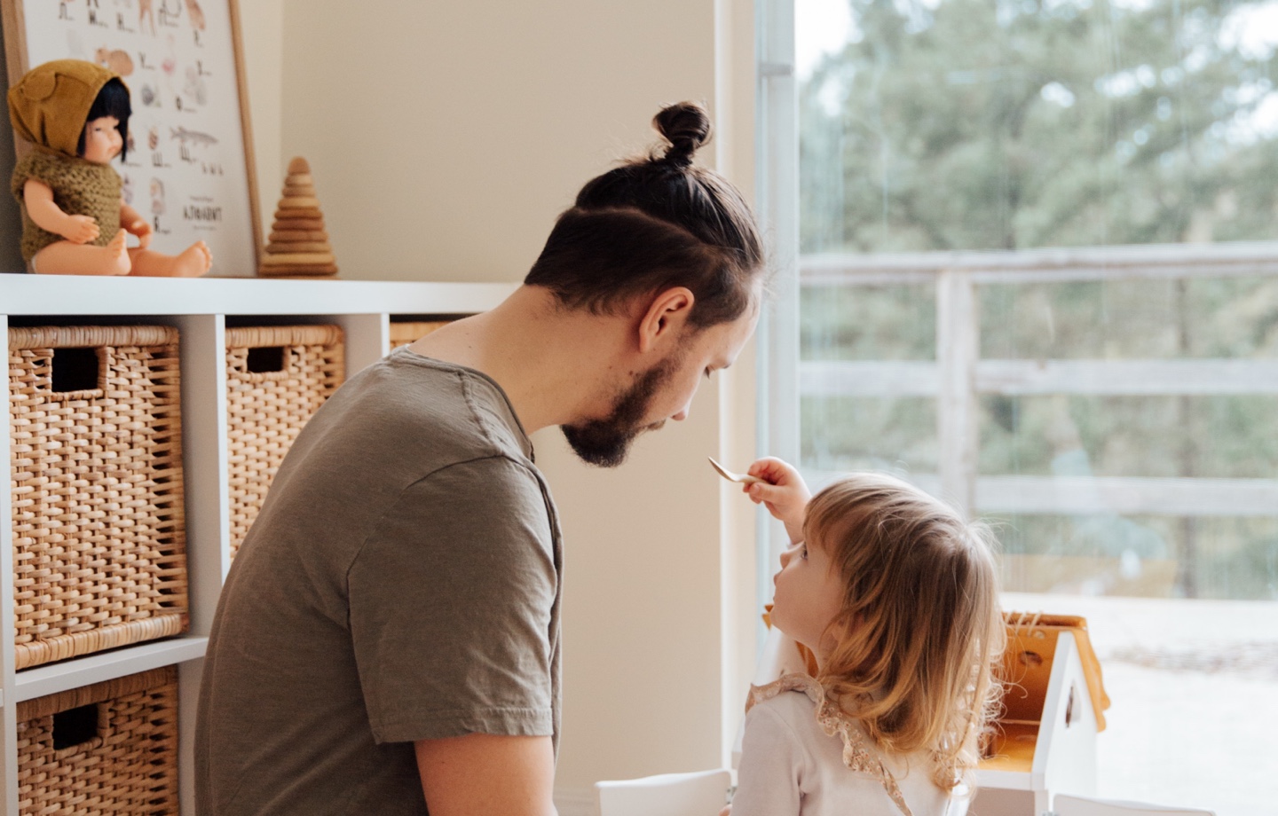 father playing with daughter