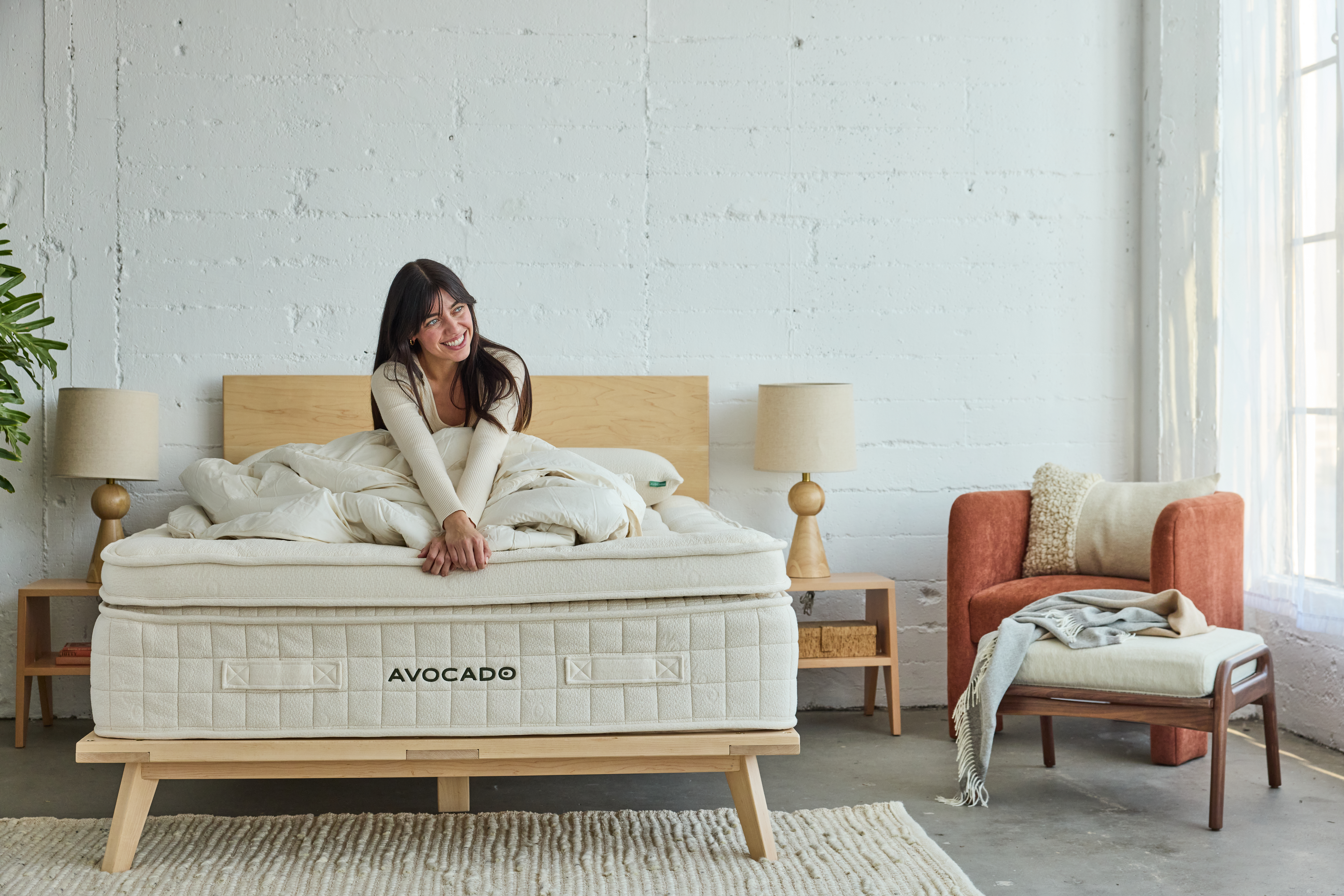 woman sitting on luxury mattress
