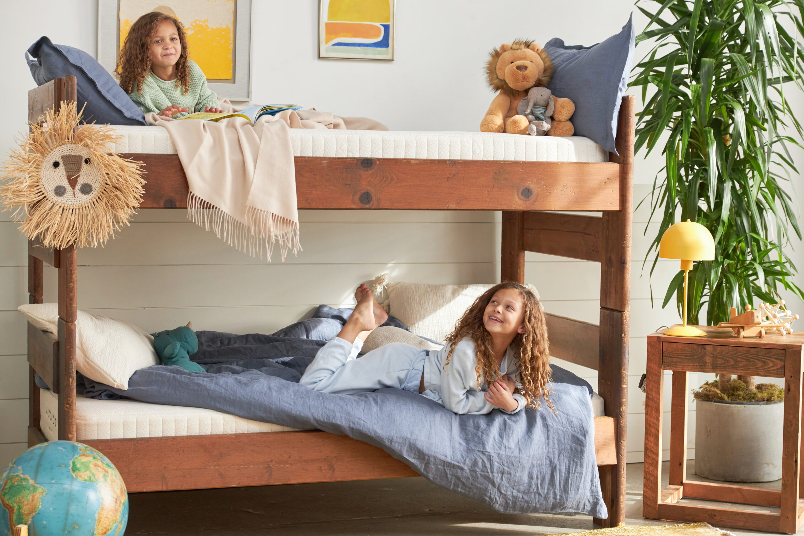 Kids on a bunk bed with avocado kids mattress