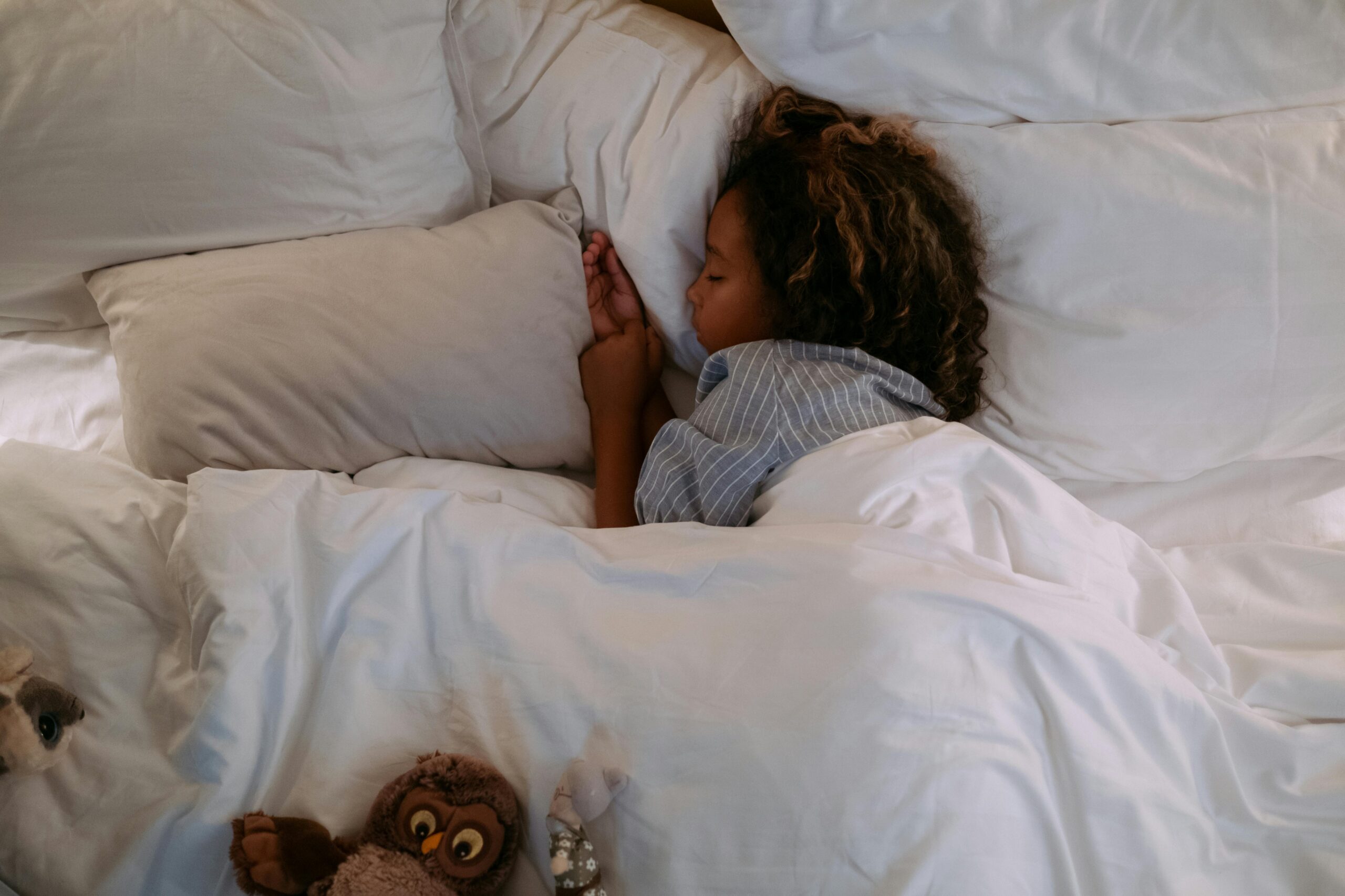 Child sleeping in bed