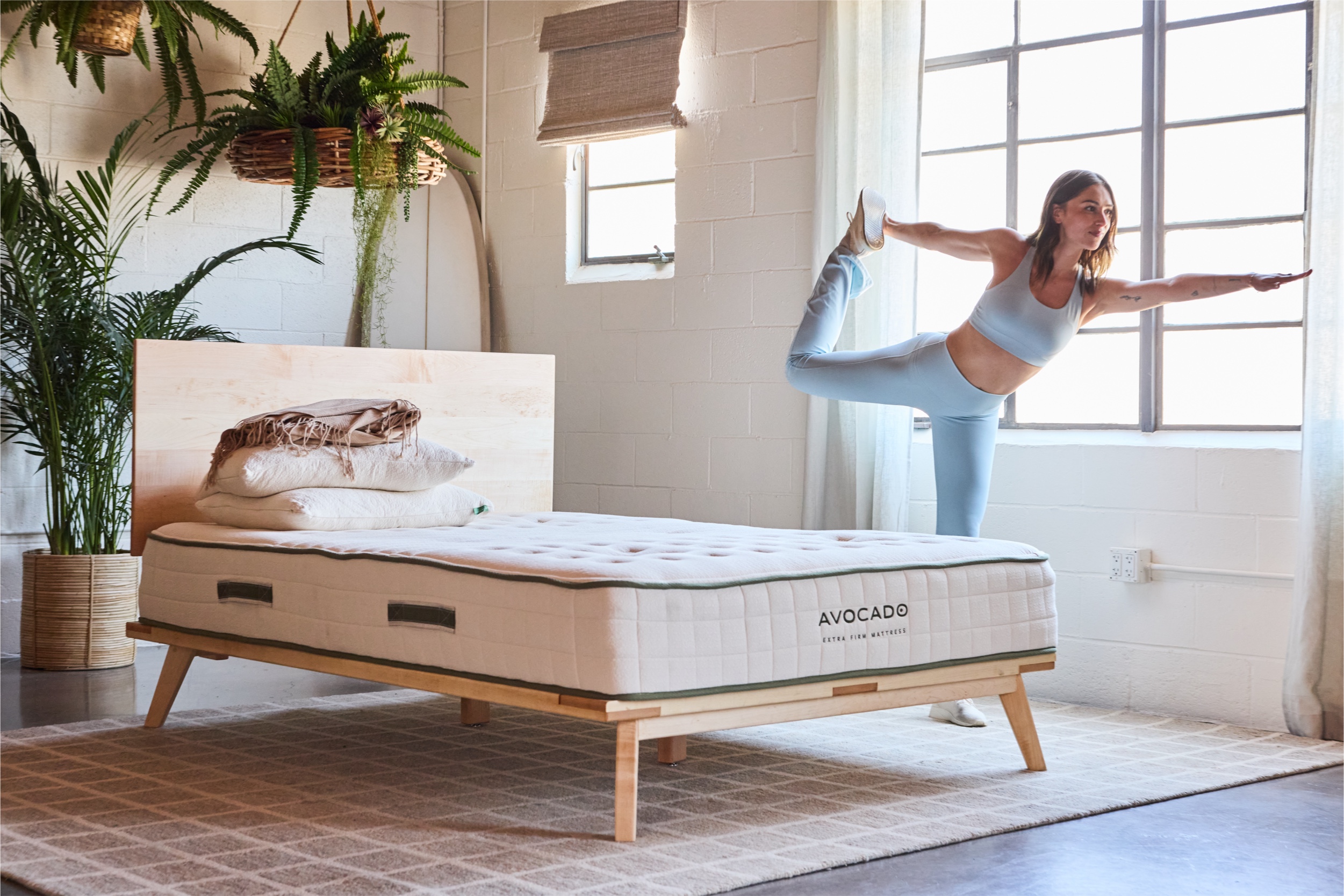 Athlete stretching by Avo Extra Firm Mattress