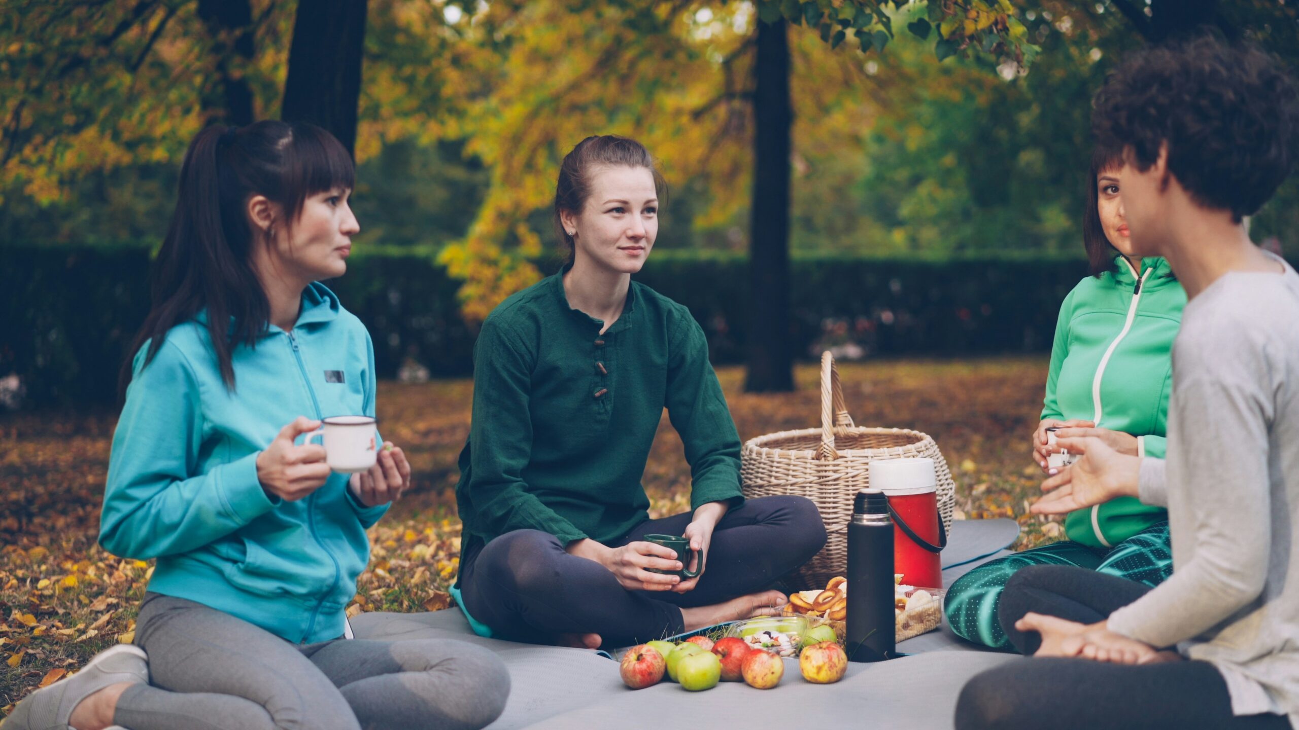 Group of Women eating in the park