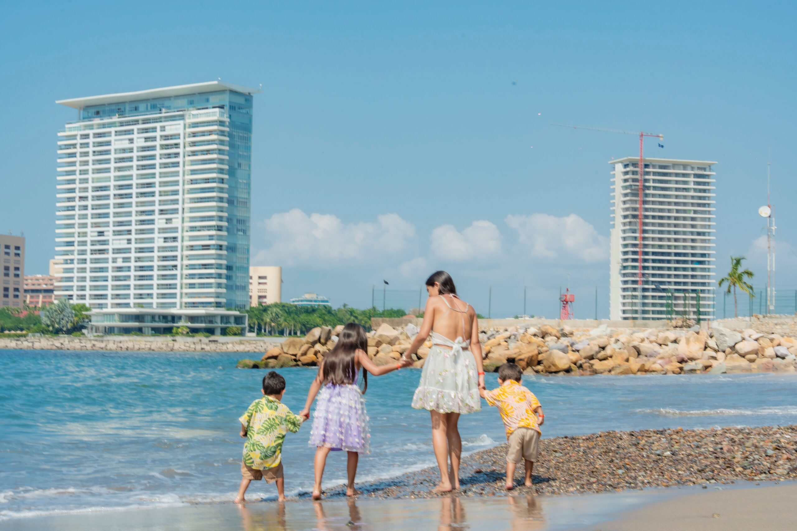 Family walking on the beach