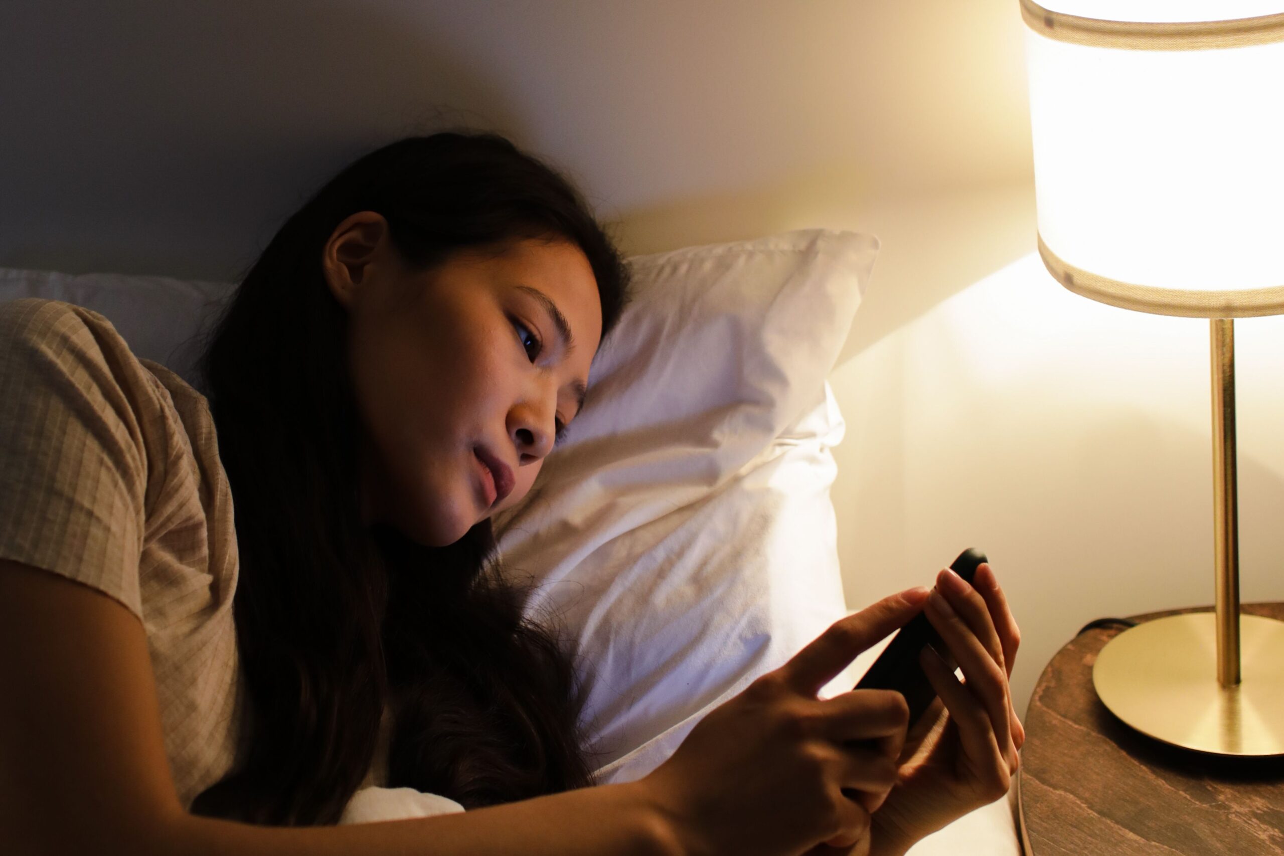 phone scrolling in bed