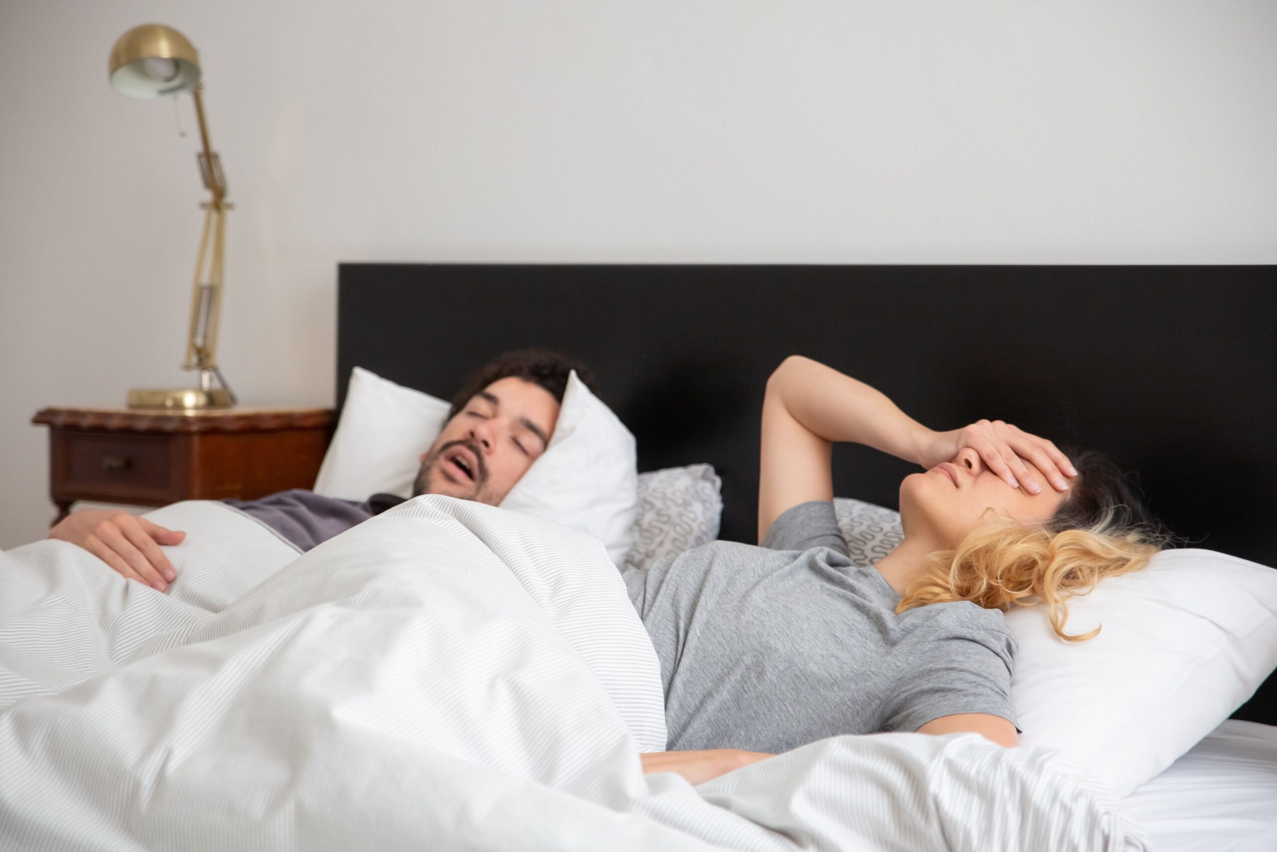 woman frustrated from trouble sleeping